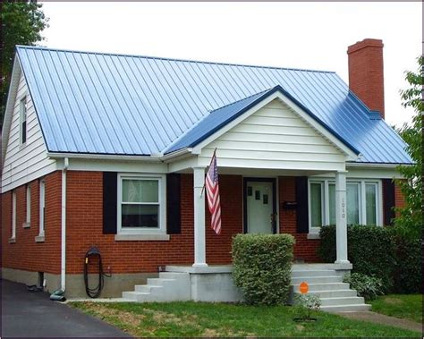 green brick house with white metal roof|metal roof for brick house.